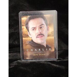 Collectible Charlie New Moon Trading Card with Protective Sheath